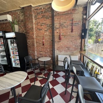 I Deal Coffee - tables and chairs in a coffee shop - Cafes Near Me - Toronto, Ontario I Deal Coffee - tables and chairs in a coffee shop - Cafes Near Me - Toronto, Ontario