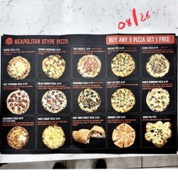 Spicy Pie - Their printed pizza menu )Aug 2026)