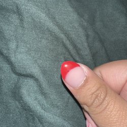 Tricycle Nail & Spa - Random clump of nail polish and the nail underneath isn't properly painted.