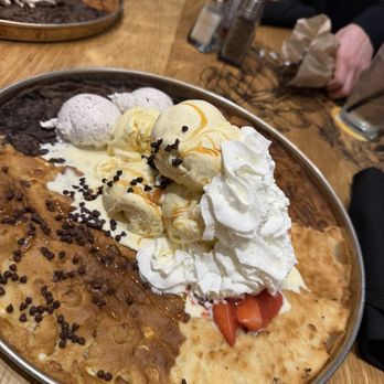 BJ's Restaurant & Brewhouse - ChocChip, Strawberry Shortcake, Cookies and Cream, Salted Caramel Pizookies with heaps of vanilla ice cream! - New American Near Me - Vacaville, California BJ's Restaurant & Brewhouse - ChocChip, Strawberry Shortcake, Cookies and Cream, Salted Caramel Pizookies with heaps of vanilla ice cream! - New American Near Me - Vacaville, California