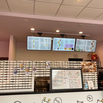 Sweet Station - a woman standing in front of the counter - Desserts Near Me - Oak Lawn, Illinois Sweet Station - a woman standing in front of the counter - Desserts Near Me - Oak Lawn, Illinois