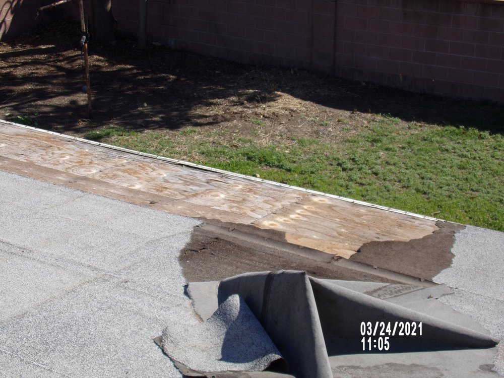 Slide of Tom Byer Roofing Service