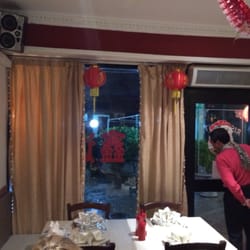 XIN DA - Looking at the front door.