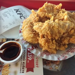 KFC - You can see the receipt, including the charge for the sauce. Notice that the pricy sauce container came half filled. The chicken sucked.