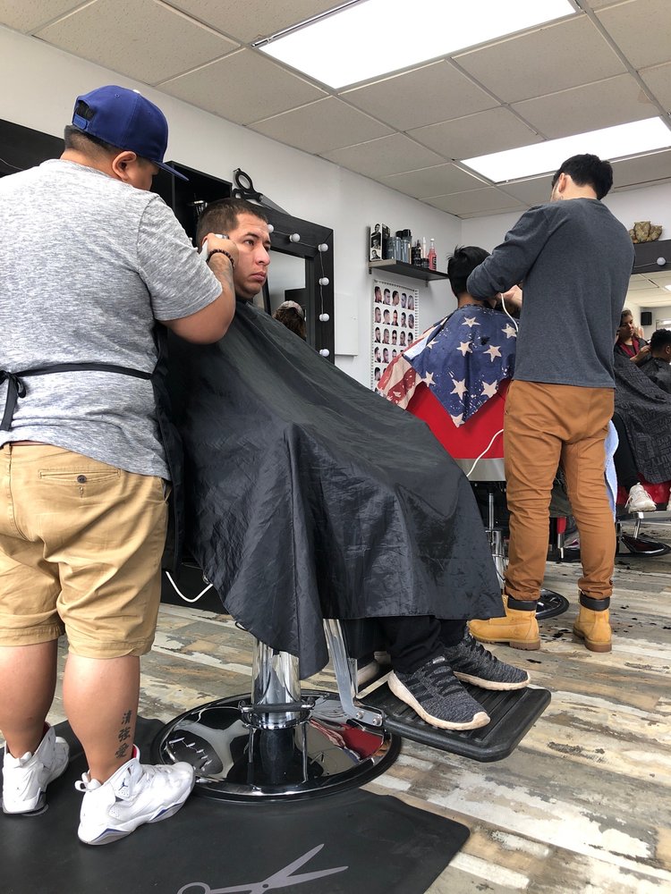 Action Barber Shop Logo