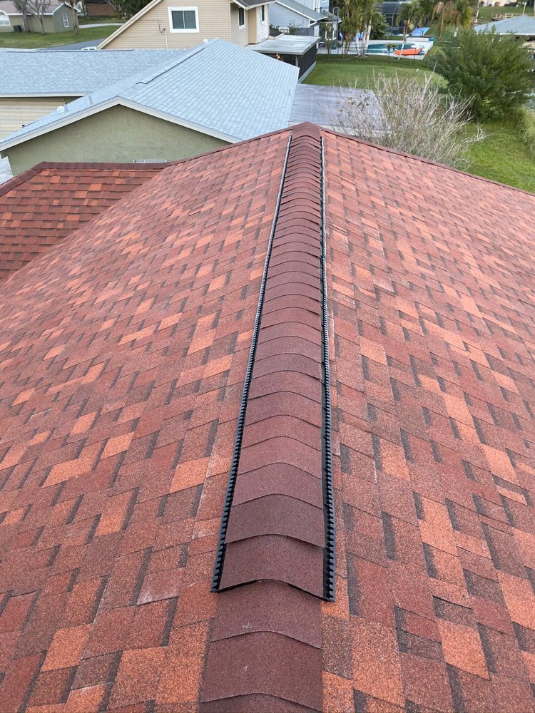 Slide of A2M Roofing
