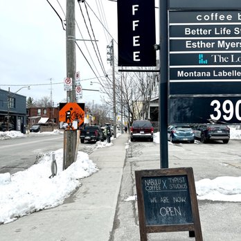 Nabulu Coffee - a sign for a coffee shop - Coffee & Tea Near Me - Toronto, Ontario