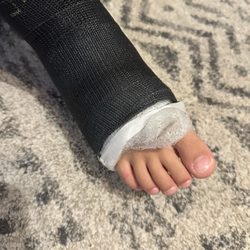 Varsity Orthopedics - The doctor used medical tape to hold the unraveling gauze in place.