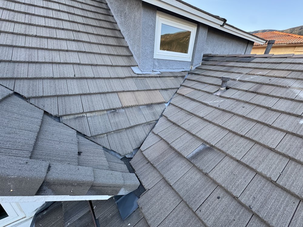 Slide of Alpha Roofing Company