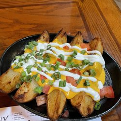 Texas Cattle Company - Potatoes with sour cream and cheese