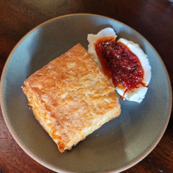 Lowland Tavern - The best biscuit I ever ate with housemade farmer cheese & pepper jelly. - New American Near Me - Charleston, South Carolina Lowland Tavern - The best biscuit I ever ate with housemade farmer cheese & pepper jelly. - New American Near Me - Charleston, South Carolina
