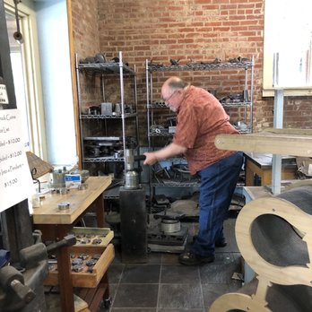 ASL Pewter - Hand-stoking a coin - Tableware Near Me - Ste. Genevieve, Missouri