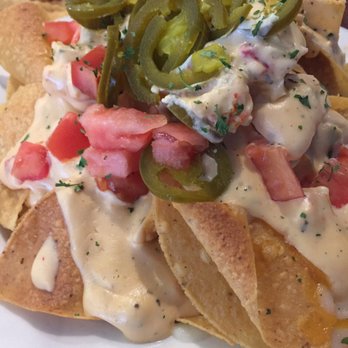 Mr Ed's Restaurant-Kenner - Appetizer (Nachos with cheese tomatoes jalapeños and crawfish in the cream sauce!)! - Cajun/Creole Near Me - Kenner, Louisiana Mr Ed's Restaurant-Kenner - Appetizer (Nachos with cheese tomatoes jalapeños and crawfish in the cream sauce!)! - Cajun/Creole Near Me - Kenner, Louisiana