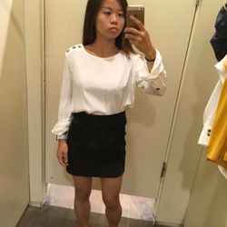 Mango - Trying on a white top