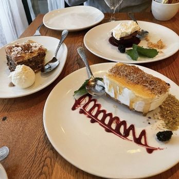 Estia - Dessert --the Cheesecake is unlike anything you can get anywhere (center, drizzled with honey) - Cocktail Bars Near Me - Radnor, Pennsylvania