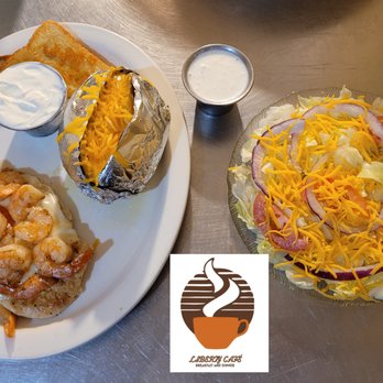 Liberty Cafe - a plate of food and a bowl of dips - Seafood Near Me - Liberty, Texas Liberty Cafe - a plate of food and a bowl of dips - Seafood Near Me - Liberty, Texas