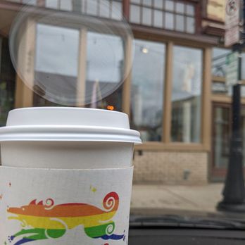 Coffee Hound - a cup of coffee in front of a building - Coffee & Tea Near Me - Bloomington, Illinois