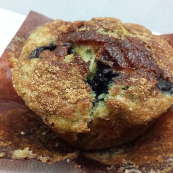Perked Up! Coffee Cafe - Blueberry muffin, slightly unwrapped to show quantity of blueberries! - Coffee & Tea Near Me - Virginia Beach, Virginia Perked Up! Coffee Cafe - Blueberry muffin, slightly unwrapped to show quantity of blueberries! - Coffee & Tea Near Me - Virginia Beach, Virginia
