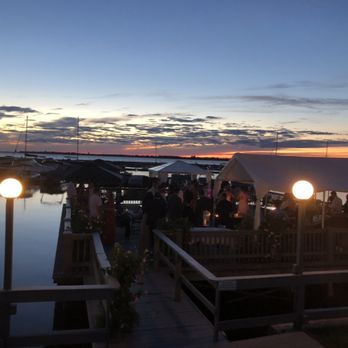 The Barracks Inn - Sunset on the dock - French Near Me - Sackets Harbor, New York