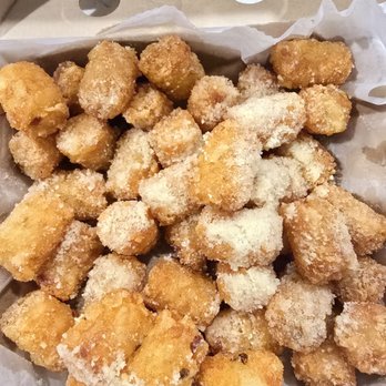 Hi Wings - These tator totts with Parmassion is super good. Also, I really enjoyed the honey biscuits. I forgot to take a Pic of those. - Chicken Wings Near Me - Austin, Texas