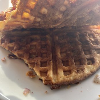 333 Pacific - Thin and burnt waffles. Bits of the char from the grill/cooker are seen on the food. - Steakhouses Near Me - Oceanside, California