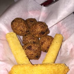 Doc's Fish & Steak - Regular hush puppies and jalapeño stick hush puppies.