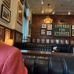 Booth seating with many eye catching, interesting Chi-town themed artifacts to enjoy.