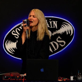 South Main Sounds - a woman singing into a microphone - Music Venues Near Me - Memphis, Tennessee South Main Sounds - a woman singing into a microphone - Music Venues Near Me - Memphis, Tennessee