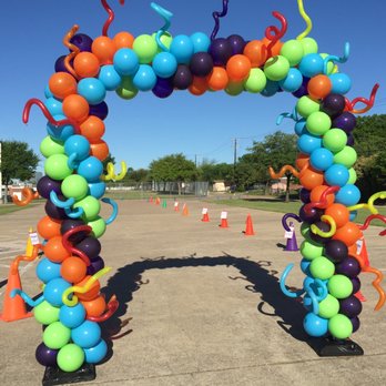 Smiles Balloon Company - Squared off at the Top Balloon Arch with curly balloon accessories - Balloon Services Near Me - Richardson, Texas Smiles Balloon Company - Squared off at the Top Balloon Arch with curly balloon accessories - Balloon Services Near Me - Richardson, Texas