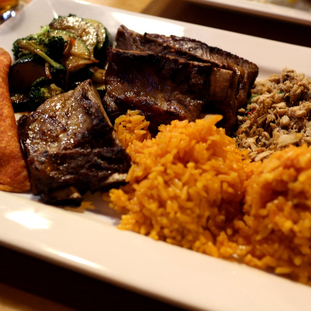 Guahan Grill - Guahan Special - pork ribs, red rice, chicken Kelaguen, stir fried veggies and an empanada - Barbeque Near Me - Oceanside, California Guahan Grill - Guahan Special - pork ribs, red rice, chicken Kelaguen, stir fried veggies and an empanada - Barbeque Near Me - Oceanside, California