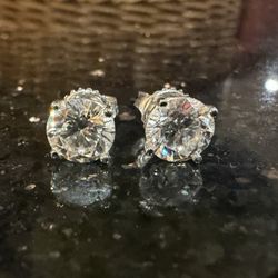 The Gold Standard of Syosset - One of their earrings