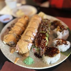 888 Sushi - Shrimp tempura, salmon and whitefish roll, dragon roll, soft shell crab.