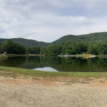 Camp Rainey Mountain - The waterfront/lake, the auditorium on the right, and the headquarters/admin building in the left - Campgrounds Near Me - Clayton, Georgia