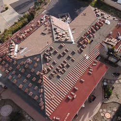 Roof King Roofing & Solar  - Reroofing in Vista: Out with the old underlayment, in with new resilience. |
Photo 1 of 4
