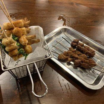 Sian City BBQ Bar - two trays of skewered food - Bars Near Me - Edmonton, Alberta Sian City BBQ Bar - two trays of skewered food - Bars Near Me - Edmonton, Alberta