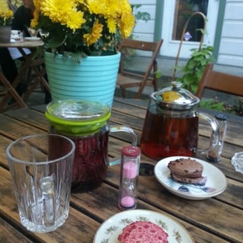 Tea List - Pot of organic earl grey tea, a cup of berry berry tea & chocolate & raspberry macaroons - Coffee & Tea Near Me - Davis, California Tea List - Pot of organic earl grey tea, a cup of berry berry tea & chocolate & raspberry macaroons - Coffee & Tea Near Me - Davis, California