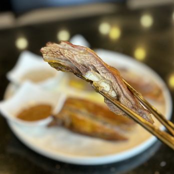 Kusan Bazaar | Silk Road Grill & Noodles 龟兹集市 - Golden Crispy Roasted Lamb Rib 黄金脆片烤羊排 | 5 pc-$22.95 - Halal Near Me - Milpitas, California Kusan Bazaar | Silk Road Grill & Noodles 龟兹集市 - Golden Crispy Roasted Lamb Rib 黄金脆片烤羊排 | 5 pc-$22.95 - Halal Near Me - Milpitas, California