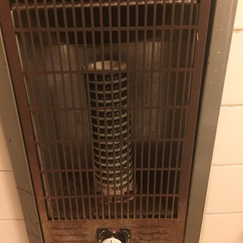 Distinctive Nashville Rentals - Rusty and dusty bathroom heater - Real Estate Services Near Me