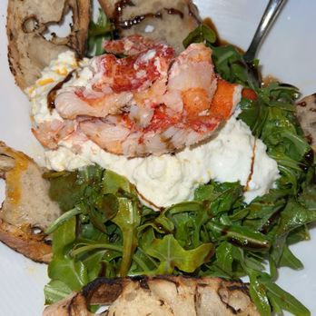 Twisted Tree - Lobster Burrata - Arugula & tomatoes tossed in a balsamic vinaigrette topped with poached lobster & served with grilled crostini - Seafood Near Me - Saint Louis, Missouri Twisted Tree - Lobster Burrata - Arugula & tomatoes tossed in a balsamic vinaigrette topped with poached lobster & served with grilled crostini - Seafood Near Me - Saint Louis, Missouri