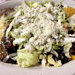 Los Compas Mexican Restaurant - Cheese and Onion, Mexican Enchiladas with added Mole sauce.