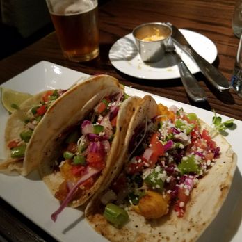 Copper Fox Gastropub - Fish tacos.  Cornmeal crusted mahi mahi, sweet/spicy snap pea cole slaw, Pico de Gallo and cotija cheese - New American Near Me - Chicago, Illinois