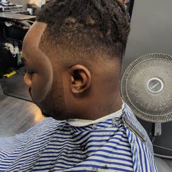 Powell's Barber Shop - Fade & beard line by B Powell