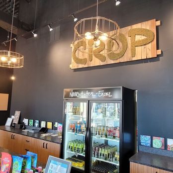 CROP Juice - a woman standing in front of the counter - Juice Bars & Smoothies Near Me - Bradenton, Florida