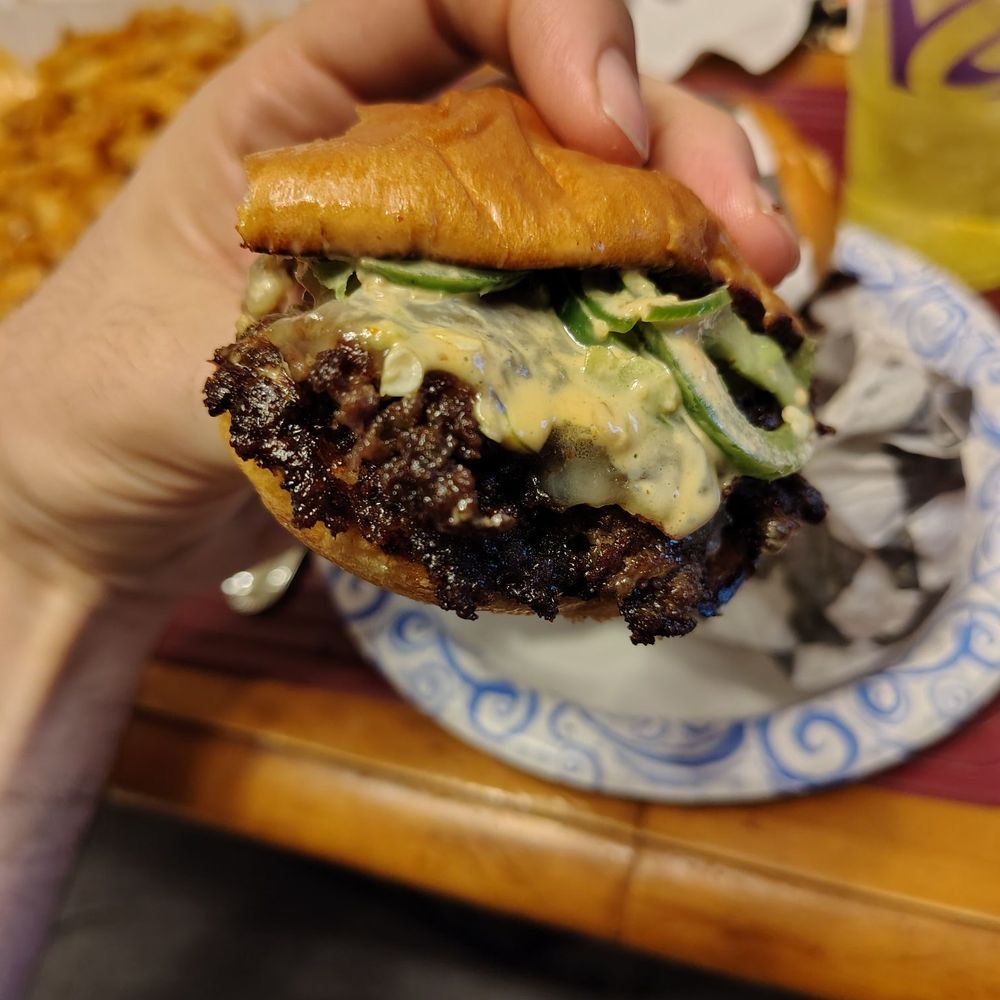 Gotham Halal - This was the Gotham heatwave..I ate half of it, so I took a picture of the backside - Burgers Near Me - Rochester, New York Gotham Halal - This was the Gotham heatwave..I ate half of it, so I took a picture of the backside - Burgers Near Me - Rochester, New York
