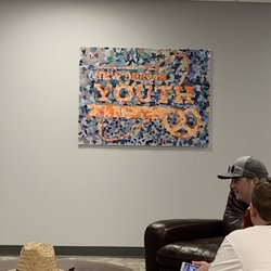 Central Baptist Church - Some members in fellowship under the New Berlin Youth sign.