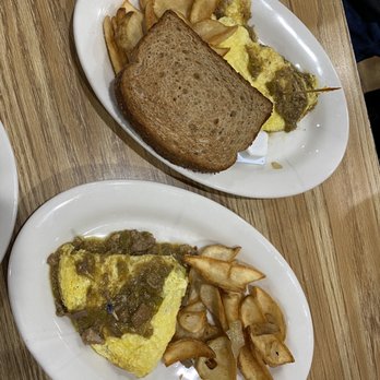 The Coffee Cup - Omelette entree split on 2 plates - Diners Near Me - Boulder City, Nevada The Coffee Cup - Omelette entree split on 2 plates - Diners Near Me - Boulder City, Nevada