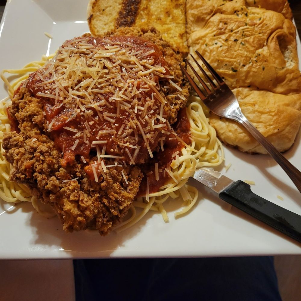Huge portion of fresh chicken parmesan. Huge portion of fresh chicken parmesan.