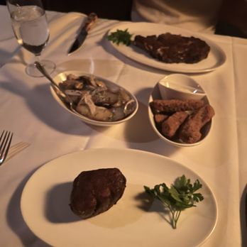 Gotham Steakhouse & Bar - 8 oz filet mignon and 20 oz rib steak with half order of lyonnaise potatoes and mushroom fries - Steakhouses Near Me - Vancouver, British Columbia