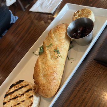 Biscottis - Brie, garlic, and jam - American Near Me - Jacksonville, Florida
