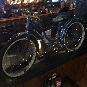 Sullivan's Publick House - A vintage bicycle that decorates the interior of Sullivan's Piblic House - Irish Near Me - Pawtucket, Rhode Island